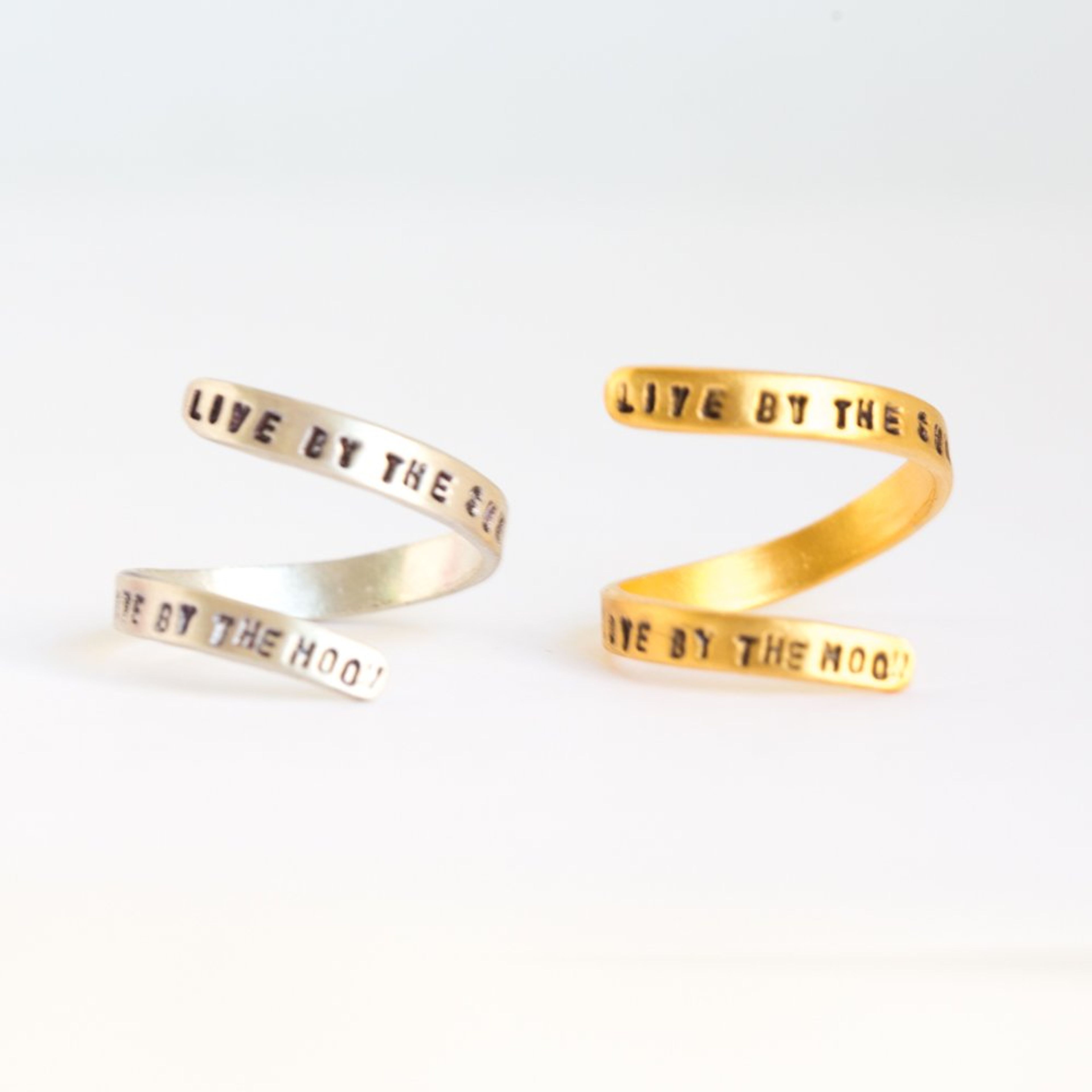 "Live by the sun, love by the moon" quote wrap ring