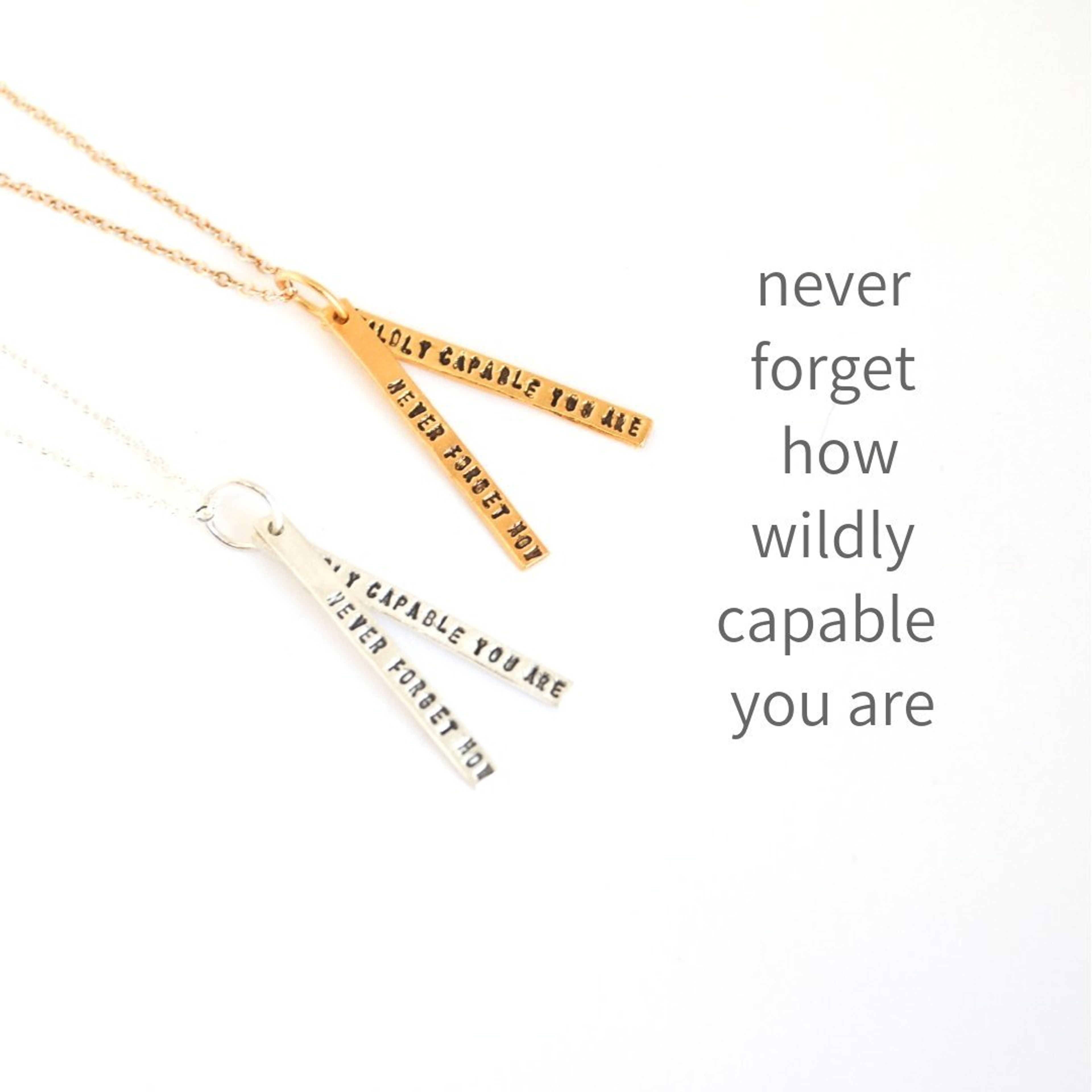 "Never forget how wildly capable you are" quote necklace