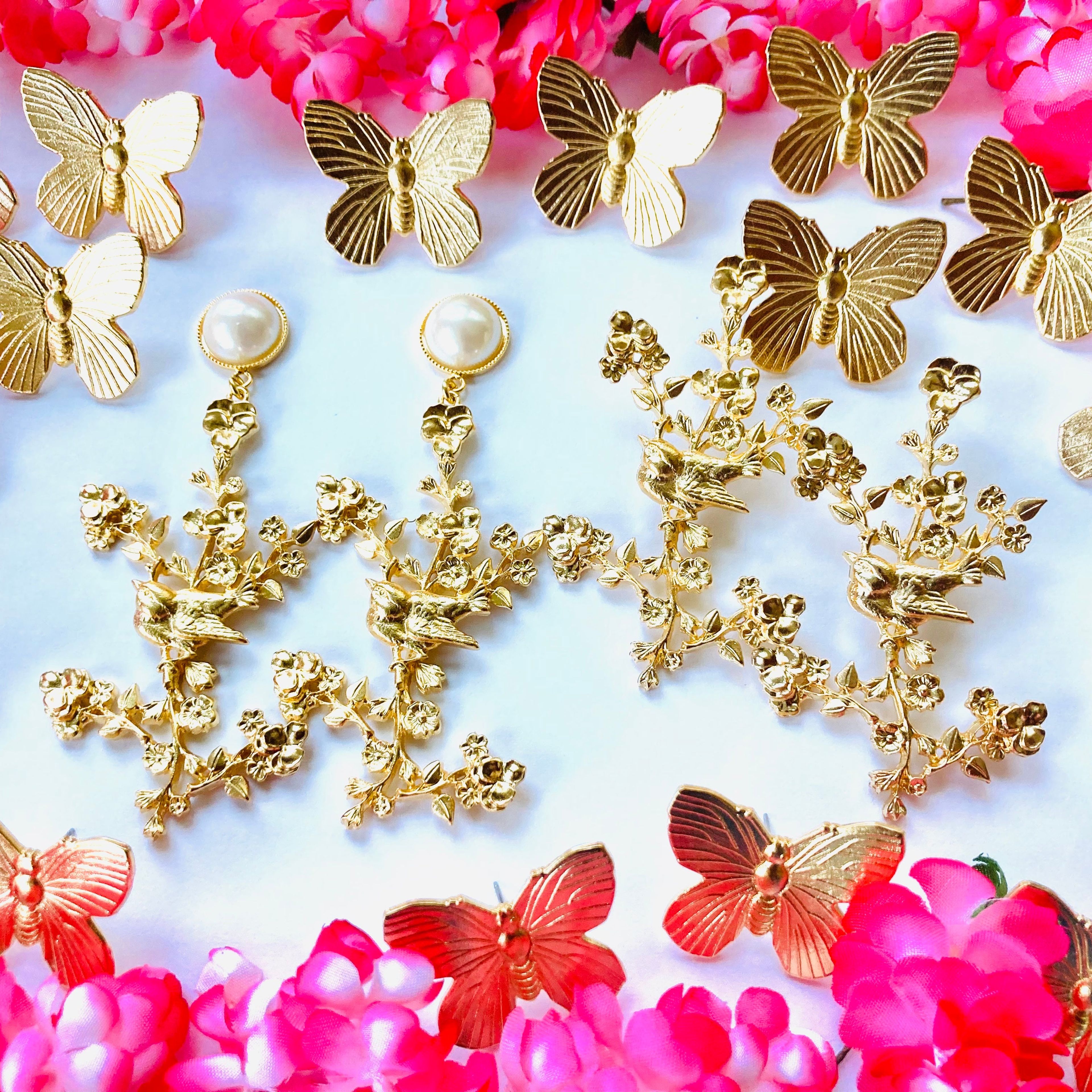 The Pink Reef butterfly stud