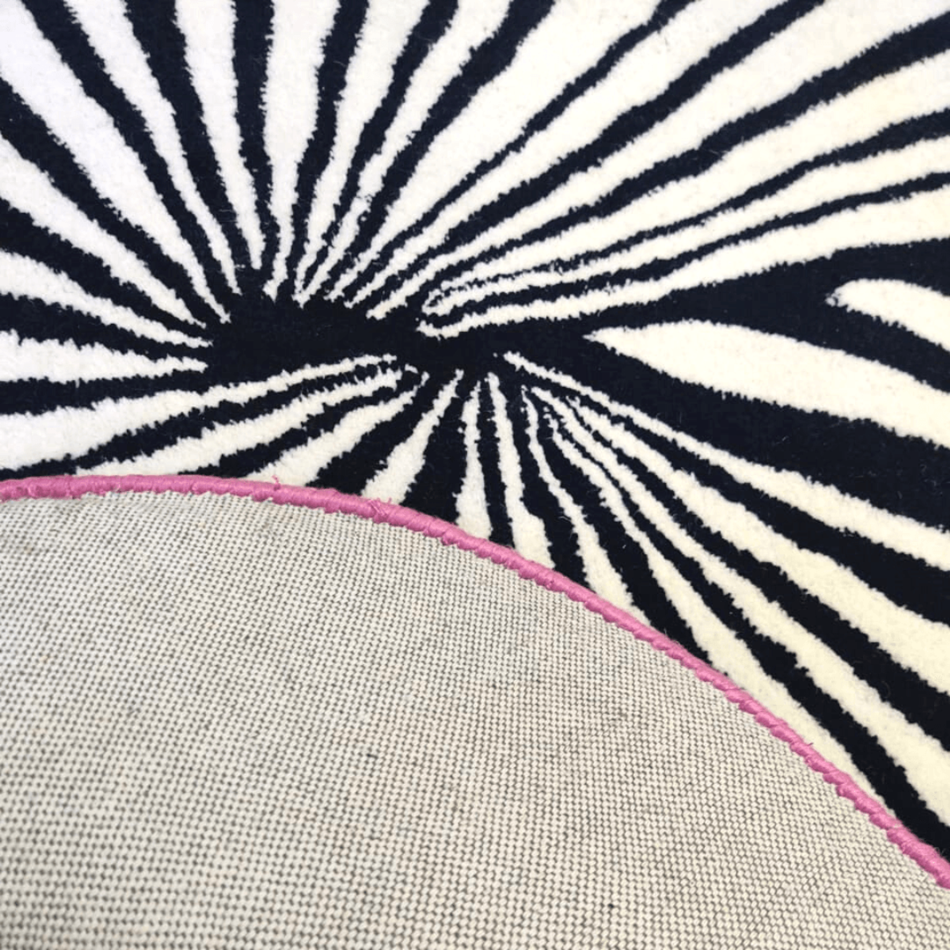 Step onto the Pink Sun Hand Tufted Wool Rug