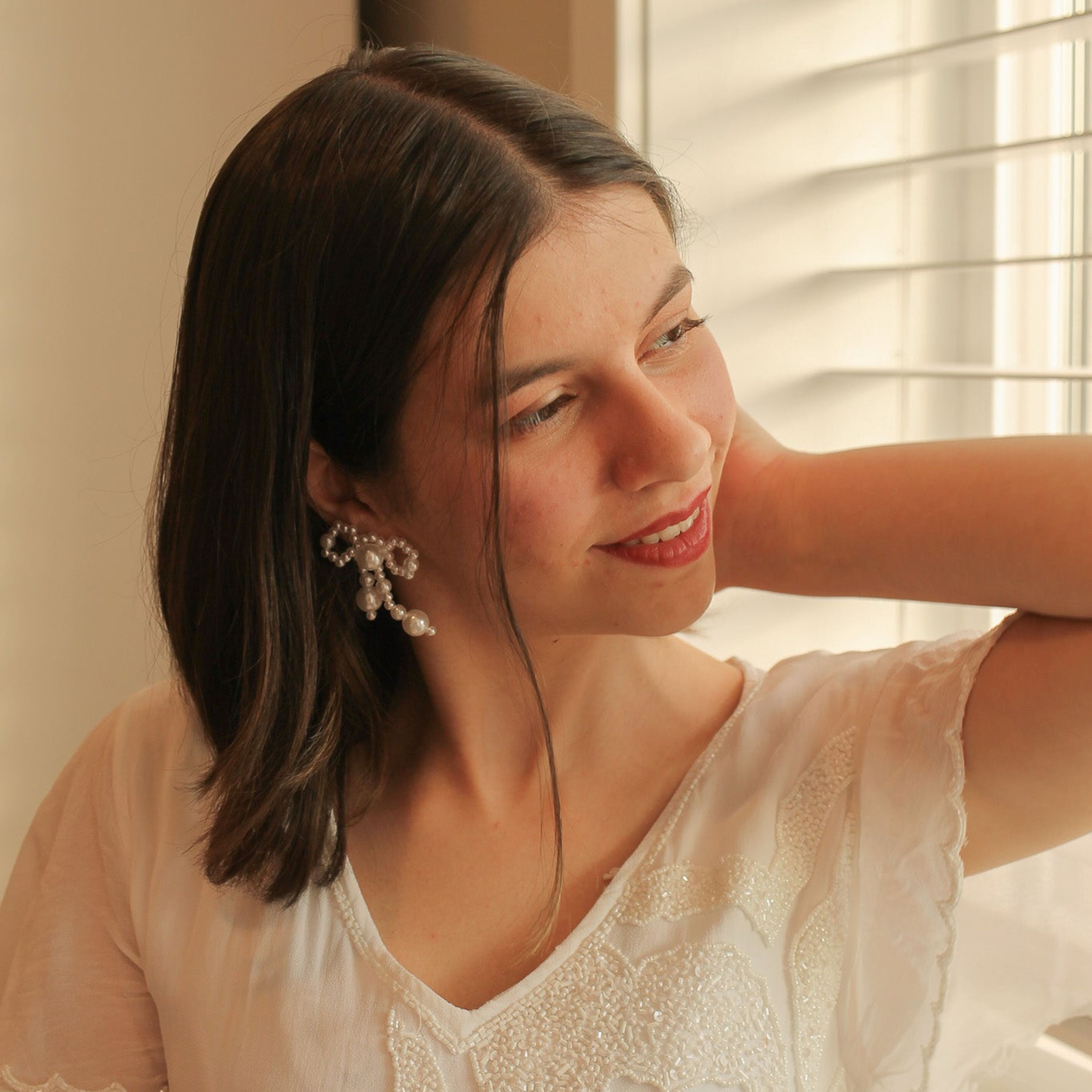 Melody Bow Earring in Pearl