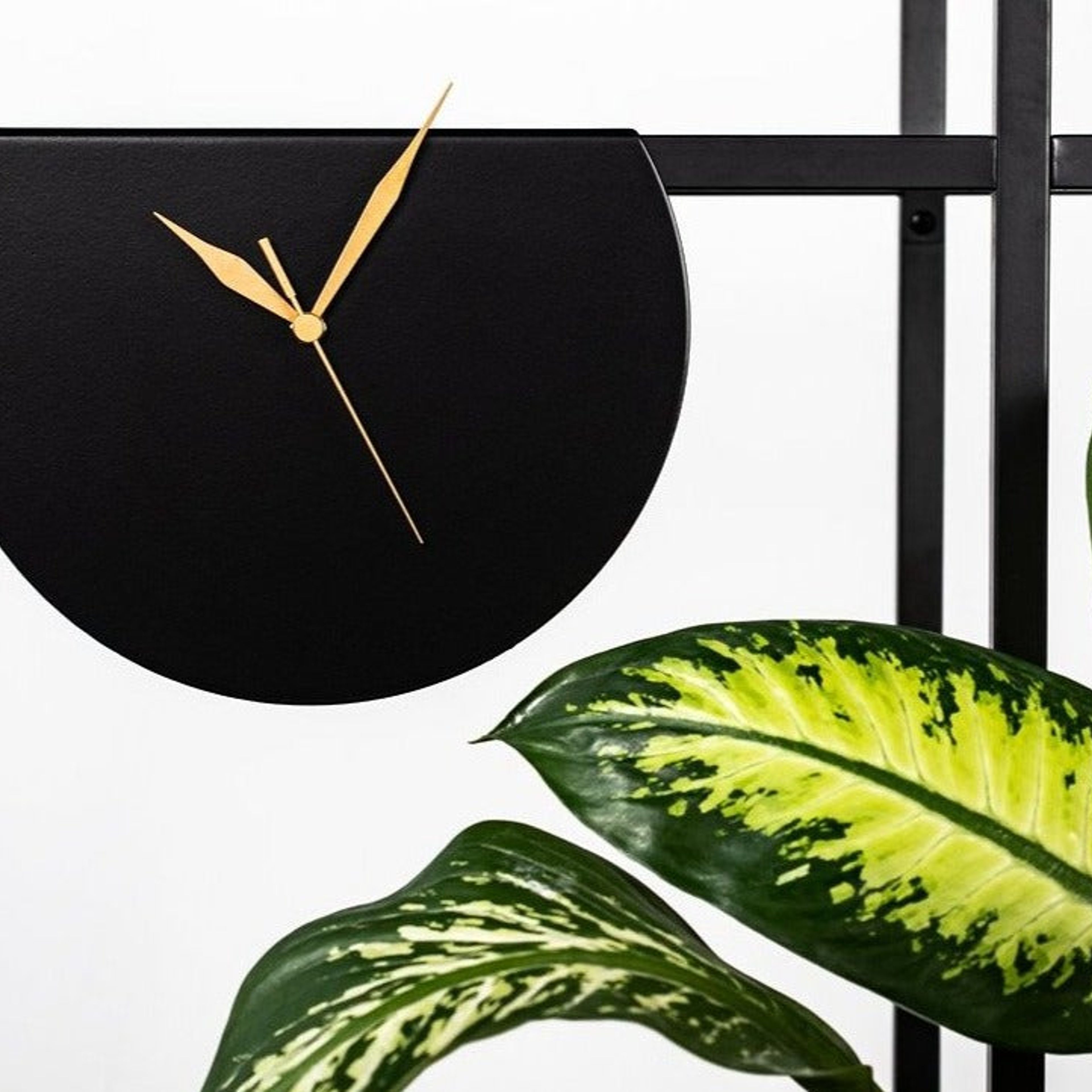GALA -  Round Black Decorative Floating Clock with Gold Hands