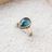 Moss Kyanite Pear Ring with 14k Gold Bezel on Taper Band
