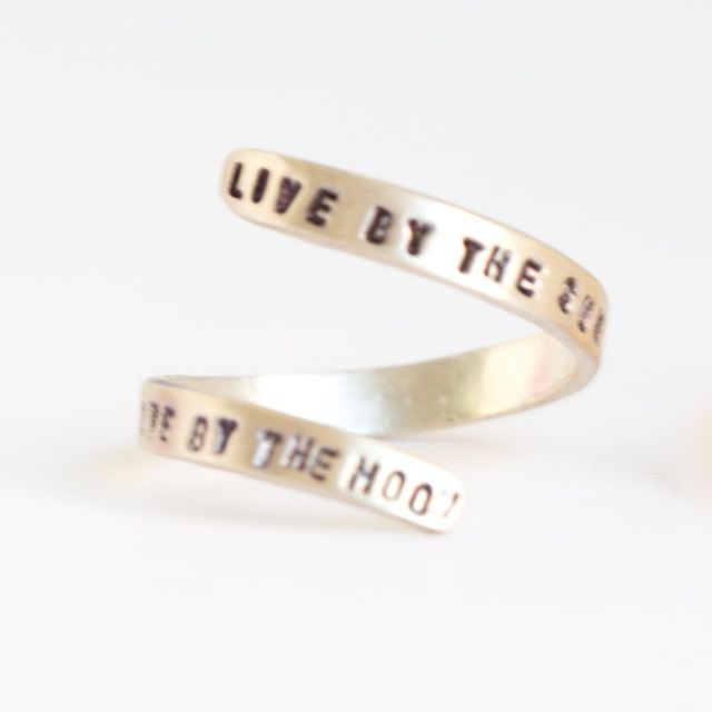 "Live by the sun, love by the moon" quote wrap ring