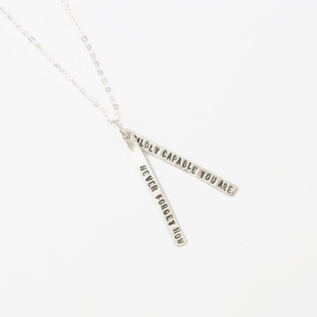 "Never forget how wildly capable you are" quote necklace